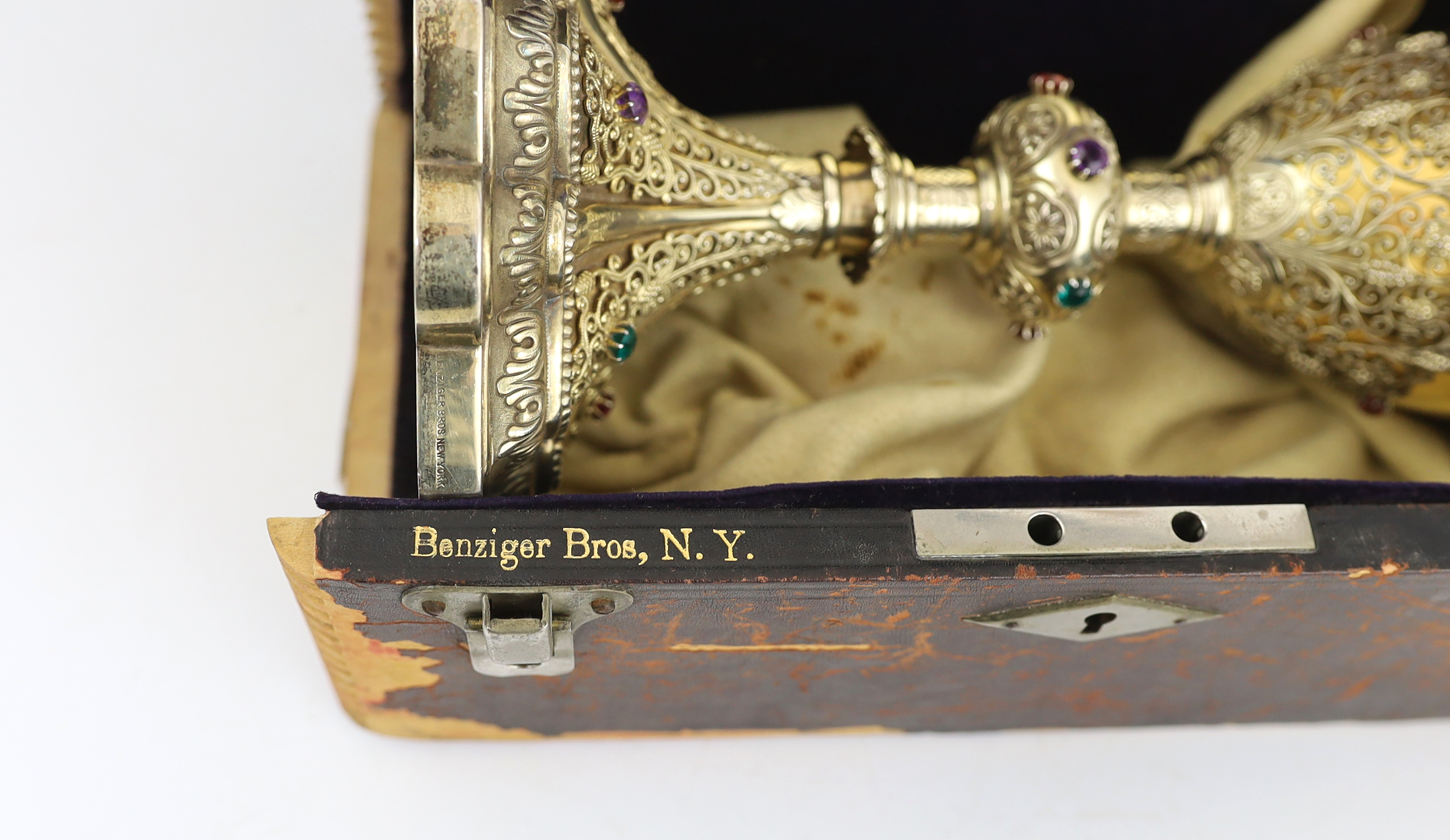 A late 19th/early 20th century American Eucharistic 14kt gold, silver gilt and multi coloured paste set chalice by Benziger Brothers, New York